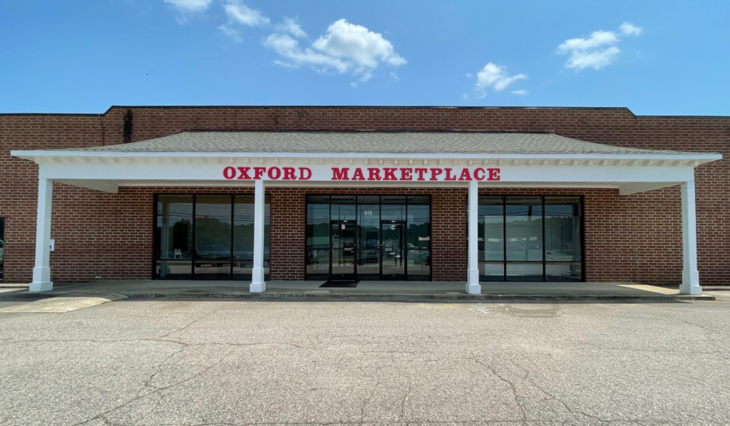 Storefront of Oxford Marketplace. Self-Storage Unit and Office Spaces are available.
